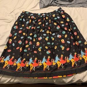 Black swing skirt with 50s dance print
